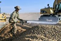 National Guardsman prepares a worksite for a major drainage project in Niger