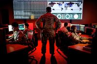 Cyberwarfare specialists serving with the 175th Cyberspace Operations Group of the Maryland Air National Guard engage in weekend training at Warfield Air National Guard Base, Middle River, Md. (Air Force photo by J.M. Eddins Jr.)