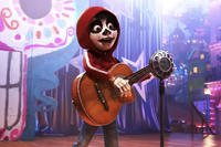 Miguel in makeup, taking the stage during a performance in Disney/Pixar's Coco (2017).