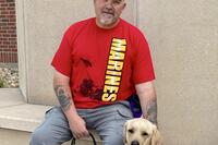 Hank Ford, an Army and Marine Corps veteran, with his dog, Tommy. (Submitted photo)