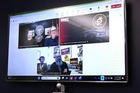 Dr. Richard Arnold, director of the Naval Aerospace Medical Research Laboratory, and Dr. Karen Mumy, director of the Environmental Health Effects Laboratory, participate in a virtual interview with Naval Medical Research Command staff for a command profile for NMRC’s SCOPE newsletter, Jan. 14, 2025, at Wright-Patterson Air Force Base, Ohio. (Zachary Wilson/Navy) Three windows open in a virtual meeting.