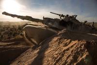 An M1A2 Main Battle Tank breaches through obstacles during the Army Warfighting Assessment (AWA) 17.1 at Fort Bliss, Texas, Oct. 21, 2016. (U.S. Army Photo/Pfc. Frederick Poirier)