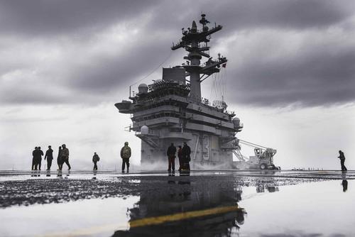 Saltwater washdown on Nimitz-class aircraft carrier USS George Washington