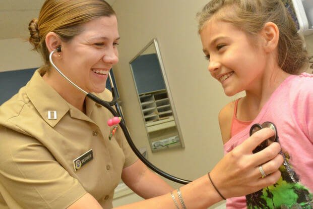 Lt. Allison Wessner, a pediatrician at Naval Hospital Jacksonville, conducts a check-up. (Photo: U.S. Navy/Jacob Sippel)