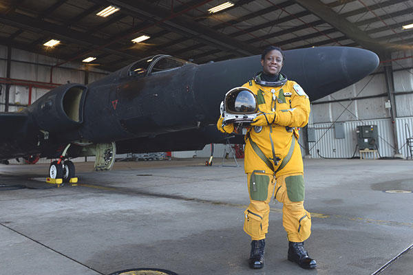 Air Force Lt. Col. Merryl Tengesdal stands in front of a U-2 at Beale Air Force Base, Calif., Feb. 9, 2015. (U.S. Air Force/Senior Airman Bobby Cummings)