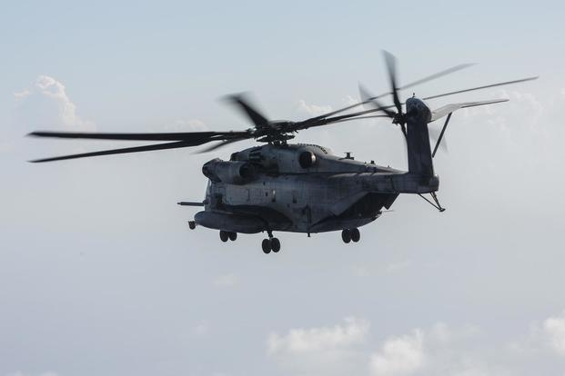 A CH-53 Super Stallion with Marine Heavy Helicopter Squadron (HMH) 462, 3rd Marine Aircraft Wing, forward deployed as part of the unit deployment program with 1st Marine Aircraft Wing, conducts a flight off the coast of Okinawa, Japan, on July 31, 2017. Lance Cpl. Christian J. Robertson/Marine Corps