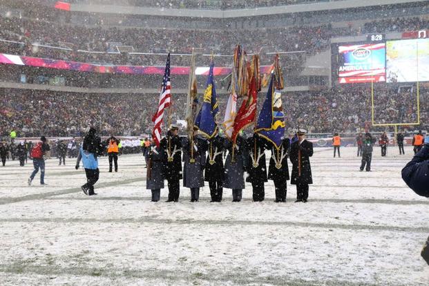 The Color Guard marches onto the field for the singing of the national anthem at the 118th Army-Navy Game. (Photo by Steve Whitman/Military.com)
