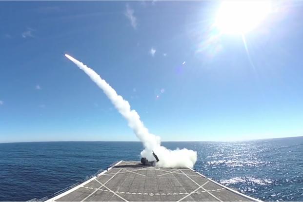 U.S. Marines launch a rocket from a High Mobility Artillery Rocket System (HIMARS) off the USS Anchorage (LPD-23) during Exercise Dawn Blitz, Oct. 22, 2017. (Photo via video by Lockheed Martin via U.S. Defense Department)