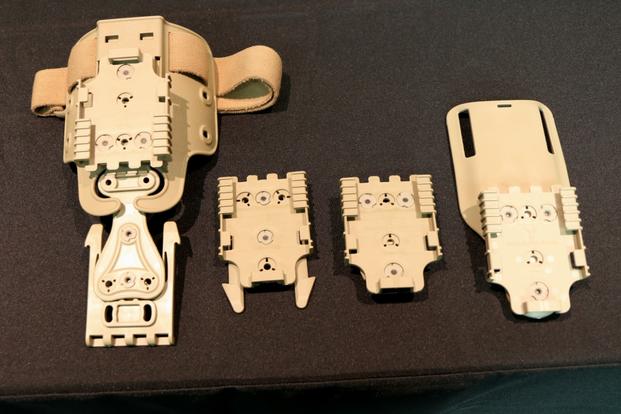 The Army's new holster for the XM17 Modular Handgun System includes various options for mounting the holster to soldier kit. (Photo by Matthew Cox/Military.com)