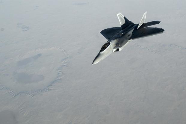A U.S. Air Force F-22 Raptor assigned to Al Dhafra Airbase, United Arab Emirates, conducts air strikes in Iraqi and Syrian airspace in support of Operation Inherent Resolve, Nov. 22, 2017. (U.S. Air Force/Tech. Sgt. Gregory Brook)