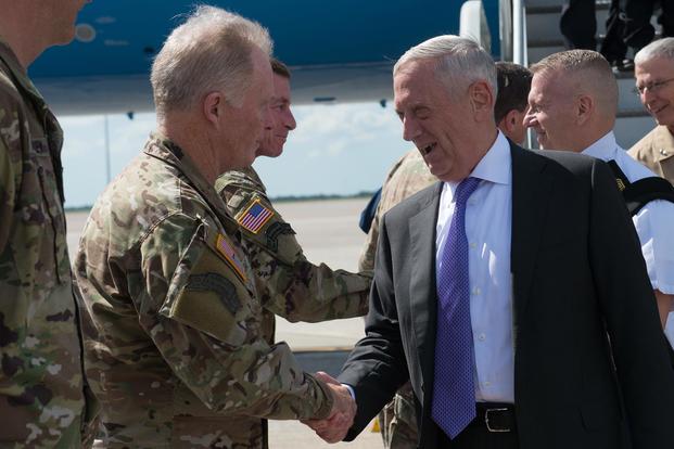 Army Gen. Raymond A. Thomas III, commander of U.S. Special Operations Command, greets the Secretary of Defense Mattis upon his arrival on MacDill AFB in Tampa, Fla., Oct. 11, 2017. (Photo/ U.S. Air Force Master Sgt. Barry Loo)