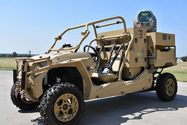 Raytheon mounted a high-energy laser on a dune buggy that may offer maneuver formations defense against drones. Raytheon photo