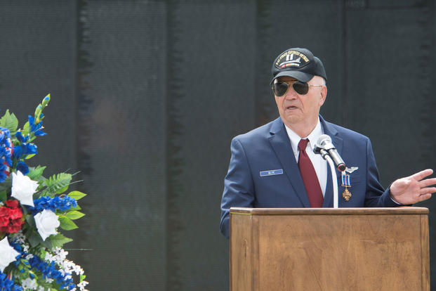 Retired Air Force Capt. Johnny Blye speaks at The Wall That Heals in Camden, S.C., May 5, 2018. Blye thanked the witnesses to the presentation of his Distinguished Flying Cross and urged Americans to remember the sacrifices of Vietnam veterans. (U.S. Air Force photo/Benjamin Ingold)