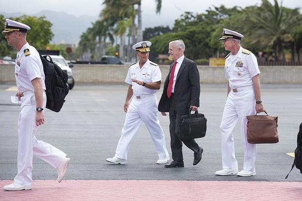Adm. John C. Aquilino, Pacific Fleet commander, greets Defense Secretary Jim Mattis on arrival at U.S. Pacific Command in Honolulu, Hawaii, on May 29, 2018. U.S. Navy photo via Twitter