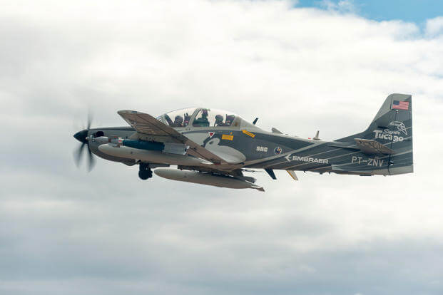 An Embraer EMB 314 Super Tucano A-29 experimental aircraft flies over White Sands Missile Range, Aug. 1, 2017. Air Force Secretary Heather Wilson has touted the "Light Attack experiment" at Holloman Air Force Base, New Mexico, as part of the service's effort to improve its acquisition process. (U.S. Air Force photo/Ethan D. Wagner)