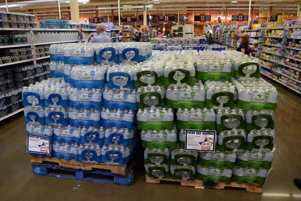 Pallets of Freedom's Choice bottled water stand at the Fort Belvoir, Virginia commissary. (Defense Commissary Agency/Kevin Robinson)