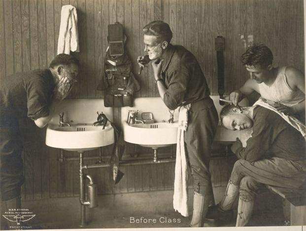 Soldiers training at the U.S. Army School of Aerial Photography in New York shave before their class. (Photo: National Archives and Records Administration)