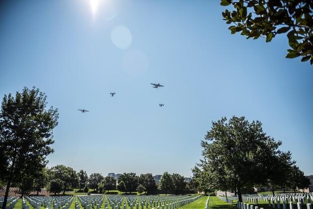 A flyover known as the Missing Man Formation passes over Section 67 and 68 at Arlington National Cemetery, Arlington, Virginia, August 24, 2018. The flyover was part of a memorial ceremony for Medal of Honor recipient U.S. Air Force Tech. Sgt. John Chapman at the U.S. Air Force Memorial in Arlington, Virginia. (Elizabeth Fraser/U.S. Army)