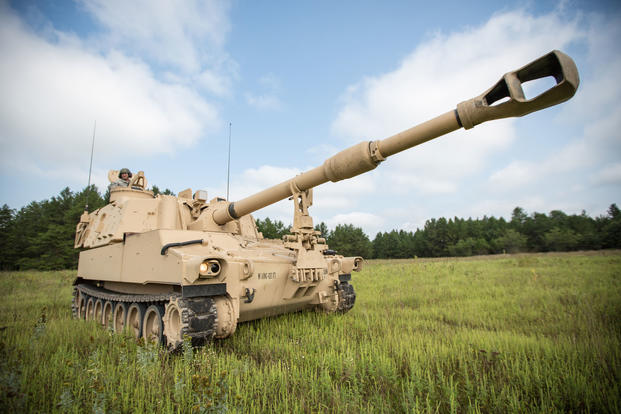 U.S. Army Wisconsin National Guard Soldiers from the 1-426 Field Artillery Battery operate an M109A6 Paladin Howitzer at Fort McCoy, Wis., August 18, 2018. (U.S. Army photo/John Russell)