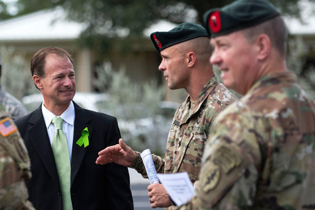 Dr. Thomas Piazza, Invisible Wounds Center director, talks with Green Berets from the 7th Special Forces Group before a ribbon-cutting ceremony to open the Air Force’s first Invisible Wounds Center at Eglin Air Force Base, Fla., Aug. 30, 2018. The center will serve as a regional treatment center for post-traumatic stress, traumatic brain injury, associated pain conditions and psychological injuries. (U.S. Air Force photo/Ilka Cole)