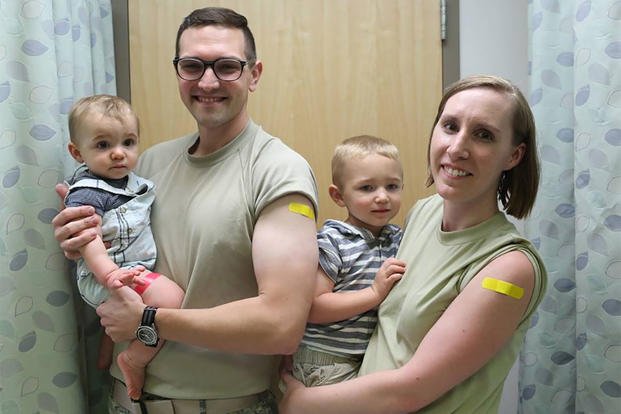 Airman Laura Sidari (right) and her family after their annual flu shots. Sidari's son, Leon, was one of 180 children to die from the flu in 2017. (Courtesy of Laura Sidari)