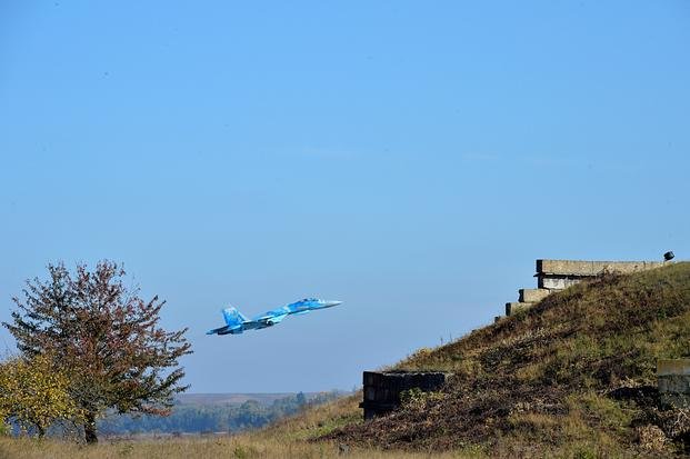 A Su-27 Flanker takes off from Starokostiantyniv Air Base, Ukraine, Oct. 10 during the afternoon launch as part of Clear Sky 2018. The exercise is the first large-scale, air-centric, multinational regional security exercise that United States Air Forces in Europe - Air Forces Africa has sponsored in eastern Europe since 2014. (Charles Vaughn/Air National Guard)
