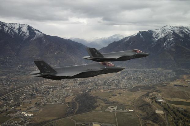 Two U.S. Air Force F-35A Lightning IIs, assigned to the 4th Fighter Squadron from Hill Air Force Base, Utah, fly over the base and the surrounding area on Feb 14, 2018. (Andrew Lee/U.S. Air Force)