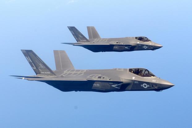 Two Navy F-35Cs fly at the left wing observation position during a training mission near Eglin Air Force Base, Fla. (U.S. Air Force photo/Staff Sgt. Brian Kelly)