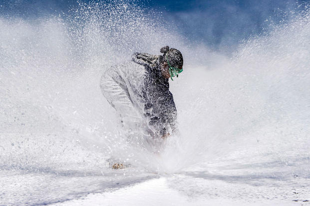 Navy Petty Officer 1st Class Sharese Grey tests a sample from a sprinkler during an aqueous film forming foam countermeasure wash-down aboard the USS Ronald Reagan during sea trials south of Japan, May 12, 2018. Navy photo by Petty Officer 2nd Class Kenneth Abbate