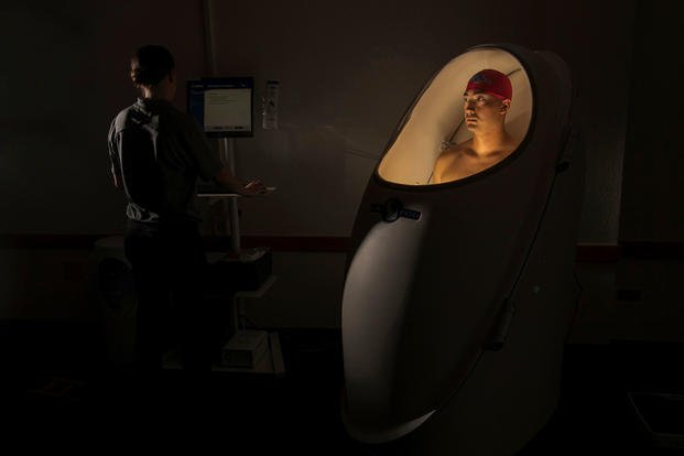 Air Force Staff Sgt. Robert Jette undergoes a body composition measurement test at a 350th Battlefield Airmen Training Squadron facility at Joint Base San Antonio, Texas, June 28, 2018. Jette is a special operations recruiter. (U.S. Air Force photo by EJ Hersom)