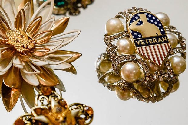 Lauren Hope's handmade jewelry re-purpose vintage military buttons and insignia. (Courtesy of Lauren Hope)