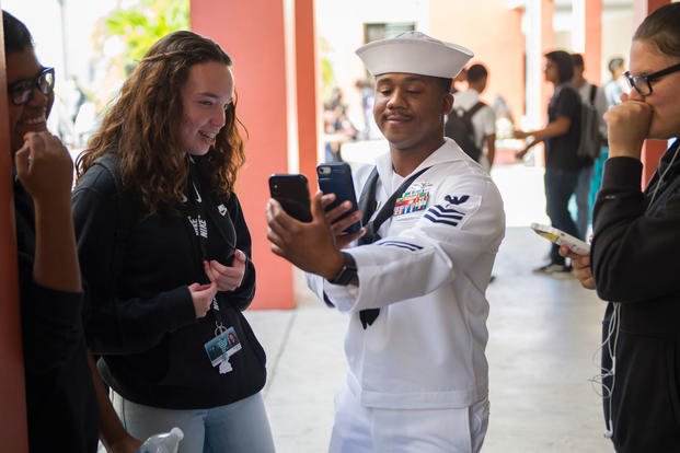 Navy Recruiters visit Felix Varela Senior High School to speak to students during the Navy Recruiting Commands Miami “Swarm” Event, December 19, 2018. (U.S. Navy photo/Zachary S. Eshleman)