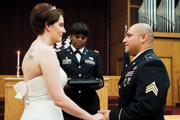  Sgt. Victor Arias, 725th Brigade Support Battalion transportation technician, and Sara, his wife, renew their wedding vows at the Soldier’s Chapel on Joint Base Elmendorf-Richardson in 2011. (U.S. Air Force/Zachary Wolf) 