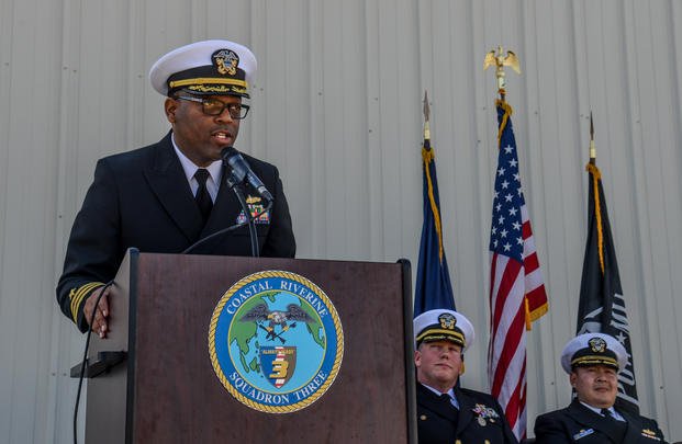 Cmdr. Randolph Chestang, reads his orders during a change of command ceremony in which he relieved Cmdr. Mark E. Postill as Commanding Officer of Coastal Riverine Squadron (CRS) 3 held onboard Naval Outlying Landing Field Imperial Beach Feb. 8, 2018. Chestang was relieved of command in February 2019. (Nelson Doromal/Navy)