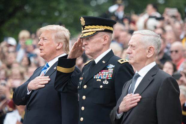 President Trump, Commanding General of the Military District of Washington U.S. Army Maj. Gen. Michael L. Howard, and Secretary of Defense James N. Mattis render honors during the Presidential Wreath Laying ceremony at the Tomb of the Unknown Soldier at Arlington National Cemetery, May 28, 2018. (Photo by Sgt. James K. McCann)