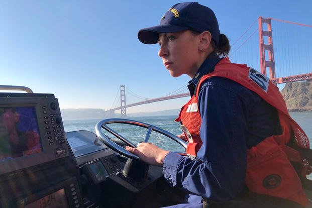 Petty Officer 1st Class Krystyna Duffy, a boatswain's mate assigned to Coast Guard Station Golden Gate in San Francisco, drives a 47-foot Motor Lifeboat near the Golden Gate Bridge, Feb. 8, 2018. (U.S. Coast Guard photo)