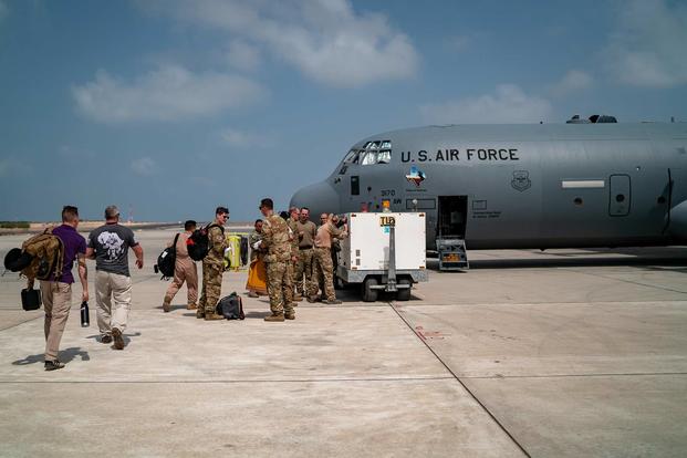Members of the 449th Air Expeditionary Group supporting Combined Joint Task Force-Horn of Africa load supplies, personnel and equipment onto a C-130J Hercules at Camp Lemonnier, Djibouti, on March 26, 2019, for the Defense Department’s relief effort in the Republic of Mozambique and surrounding areas following Cyclone Idai. (U.S. Air Force photo by Tech. Sgt. Thomas Grimes)