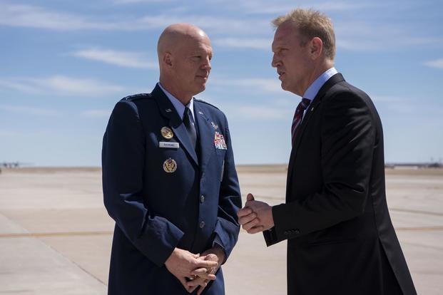 U.S. Acting Secretary of Defense Patrick M. Shanahan greets the commander of U.S. Air Force Space Command, Air Force Gen. John W. “Jay” Raymond, Peterson Air Force Base, Colorado, April 8, 2019. (DoD/Lisa Ferdinando)