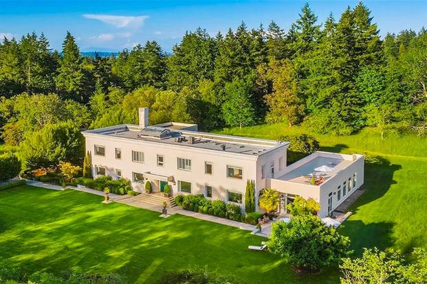 The 12,018-square-foot mansion for sale on Bainbridge Island in Washington state was once the hub for a vital World War II mission. (Image courtesy Realtor.com)