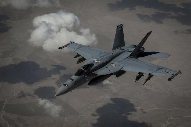 A U.S. Navy F/A-18E Super Hornet flies over Iraq in support of Operation Inherent Resolve, June 15, 2018. (U.S. Air Force/Staff Sgt. Corey Hook)