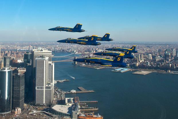 The U.S. Navy Flight Demonstration Squadron, the Blue Angels, fly in the world-renowned Delta Formation past the New York skyline in 2013. (U.S. Navy photo by Mass Communication Specialist 1st Class Terrence Siren)