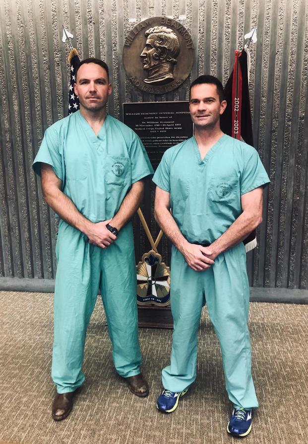 Army doctors Maj. Chris Bell and Lt. Col Justin Orr from William Beaumont Army Medical Center at a ceremony recognizing more than a dozen Army medical personnel for treating victims of the El Paso shooting. (U.S. Army Photo)