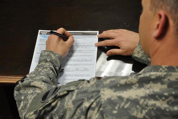 A U.S. Army soldier attempts to complete his 2010 Census form. 