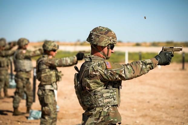 2nd Lt. Michael Preston fires an M17 pistol during a pistol qualification range, October 10, 2019. (U.S. Army/Pvt. Matthew Marcellus)