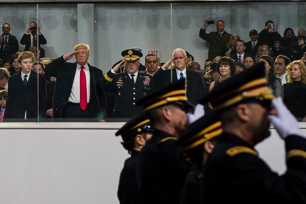 President Donald Trump, Gen. Mark Milley and Vice President Mike Pence salute a formation of U.S. Army soldiers taking part in the 58th Presidential Inauguration Parade in Washington, D.C., on Jan. 20, 2017. (U.S. Army Reserve photo/Michel Sauret)