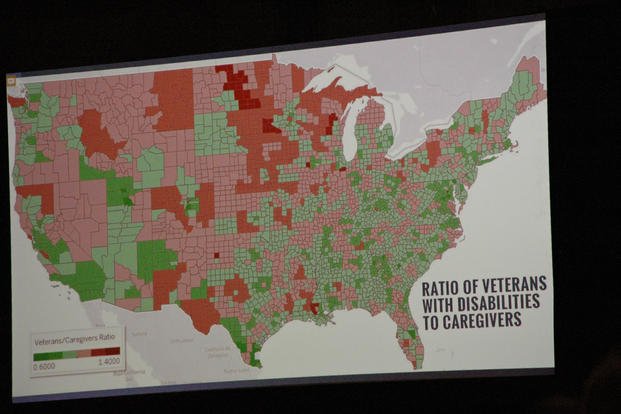 Booze Allen Hamilton Chief Medical Officer Dr. Kevin Vigilante explains the features of a new tool that maps out where military caregivers live. (Military.com photo/Dorothy Mills-Gregg)