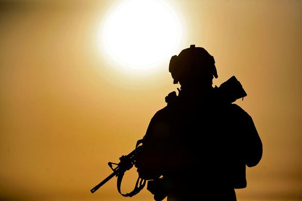 A U.S. service member stands in Iraq.