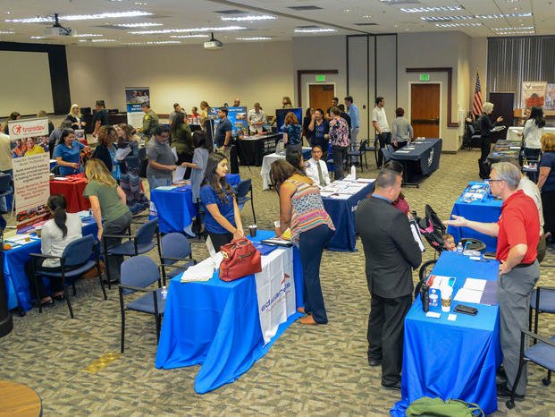 Military spouses attend a job fair. 