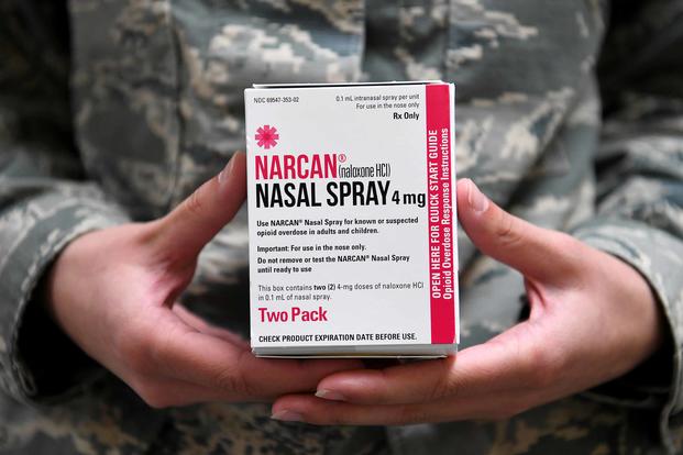 An airman at the 178th Wing holds Nalaxone (Narcan), distributed to use in case they encounter someone experiencing an opioid overdose May 6, 2019, at Springfield Air National Guard Base, Ohio. (U.S. Air National Guard photo by Senior Airman Amber Mullen)