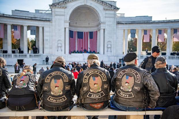 Visitors attend the National Veterans Day Observation at Arlington National Cemetery on Nov. 11, 2019.